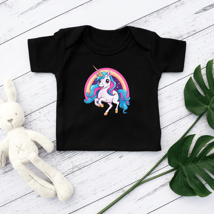 Black t-shirt featuring a bright unicorn and rainbow print, ideal for birthdays, playtime, or everyday wear.