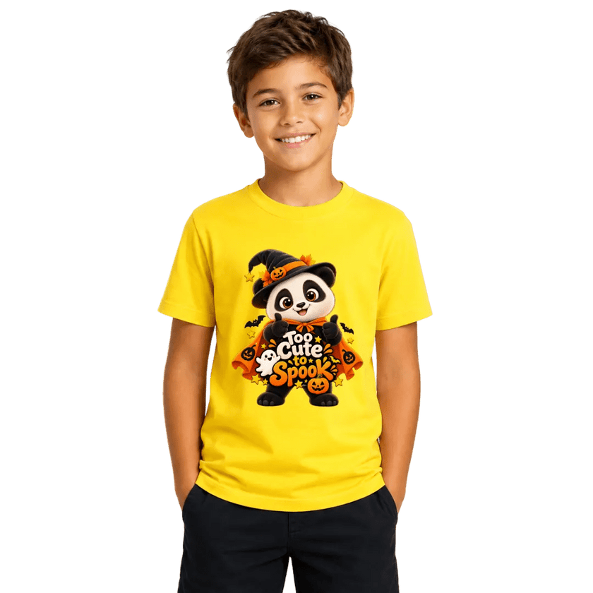 Boy wearing a bright yellow kids panda Halloween T shirt featuring a cute witch panda and Too Cute to Spook design
