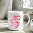 11oz white mug with pink heart matchbox and red hand-lettered love phrase