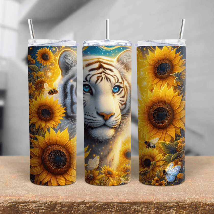 A vibrant tumbler featuring a white tiger surrounded by bright sunflowers, bees, and butterflies. on a stainless steel cup.
