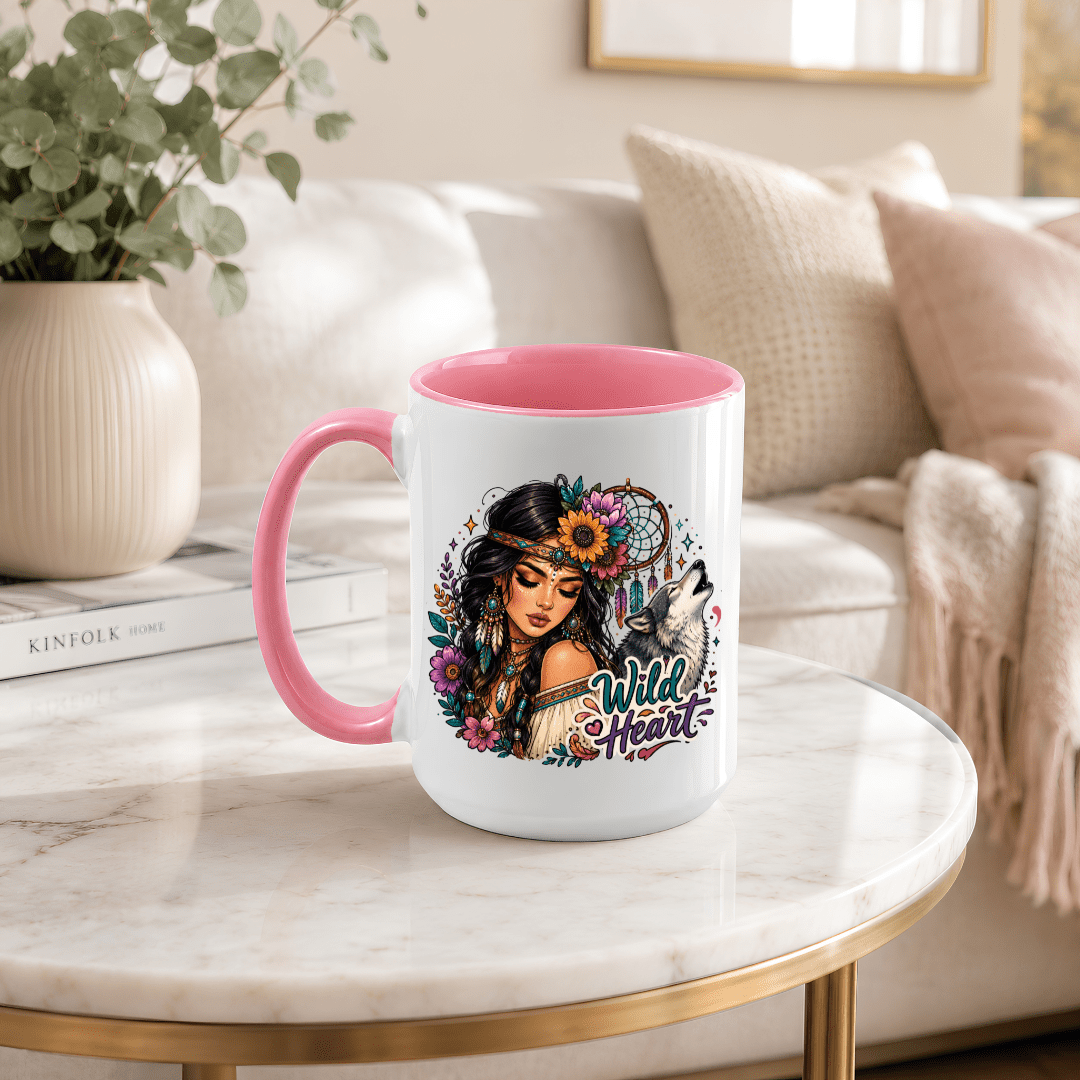 Wild Heart ceramic mug with pink handle and interior featuring a woman, howling wolf, florals and colourful bohemian artwork