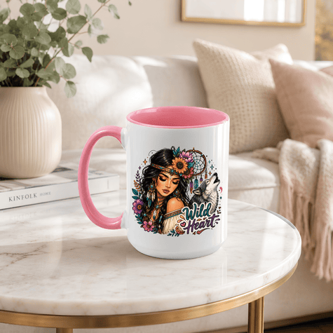 Wild Heart ceramic mug with pink handle and interior featuring a woman, howling wolf, florals and colourful bohemian artwork