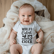 Smiling baby wearing funny World’s Cutest Alarm Clock infant bodysuit in soft white cotton fabric