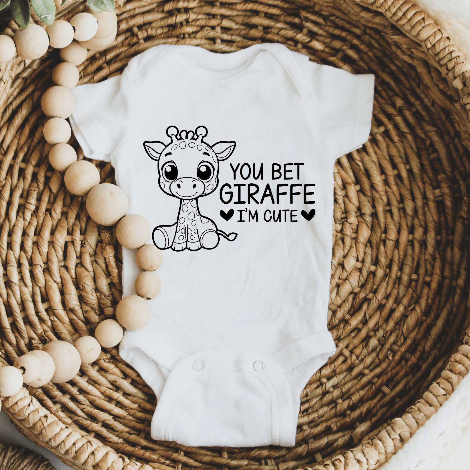 Soft white infant onesie with cartoon giraffe graphic perfect for safari nursery themes