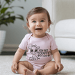 Funny baby outfit featuring giraffe character and cute phrase ideal for baby shower gifts