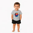 Toddler boy wearing a sport grey youth basketball shirt with colourful basketball graphic for casual everyday wear.